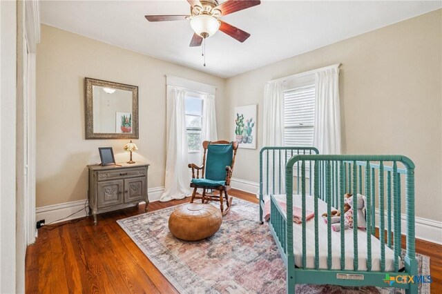 1004 Mitchell St, Gonzales, TX 78629 - bedroom with wood finished floors and baseboards