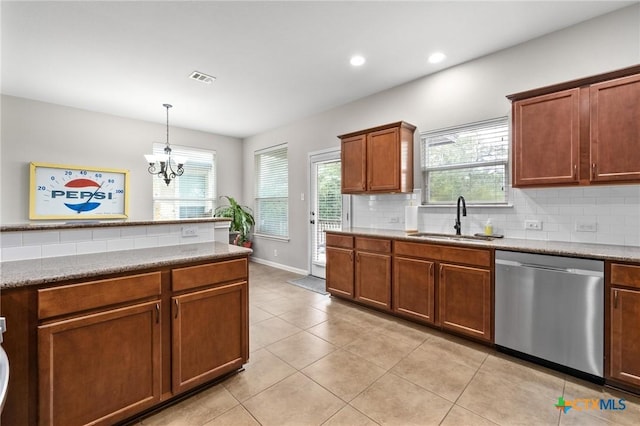 11602 Buster Crabbe Dr, Austin, TX 78748 - kitchen with dishwasher, tasteful backsplash, plenty of natural light, a chandelier, and recessed lighting