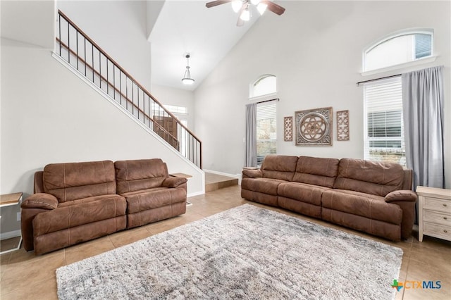11602 Buster Crabbe Dr, Austin, TX 78748 - tiled living area featuring stairs, ceiling fan, and high vaulted ceiling