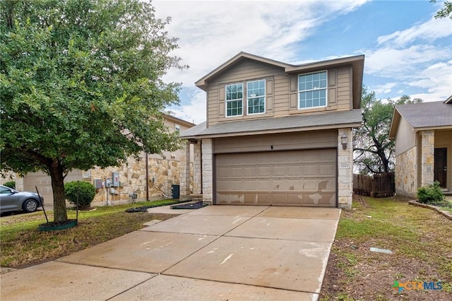 11602 Buster Crabbe Dr, Austin, TX 78748 - traditional-style home with stone siding, an attached garage, concrete driveway, and roof with shingles