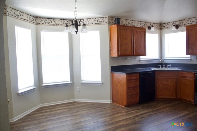 4207 Hitchrock Dr, Killeen, TX 76549 - kitchen featuring a chandelier, dishwasher, a sink, and dark wood-style floors