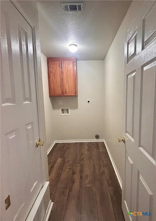 4207 Hitchrock Dr, Killeen, TX 76549 - clothes washing area featuring washer hookup, baseboards, cabinet space, and visible vents