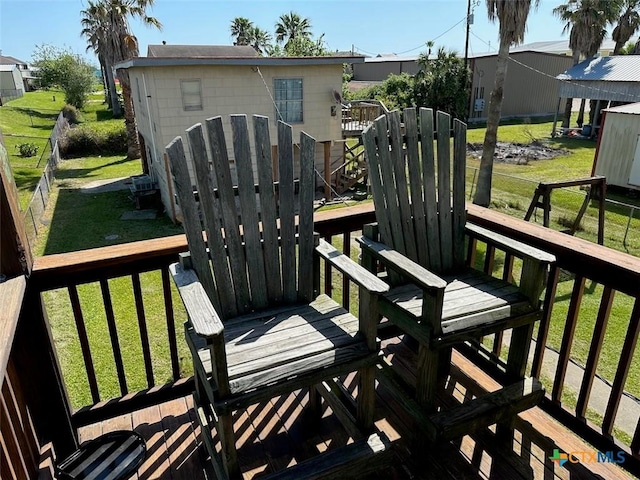 415 S 15th St, Port Oconnor, TX 77982 - wooden terrace featuring fence and a yard