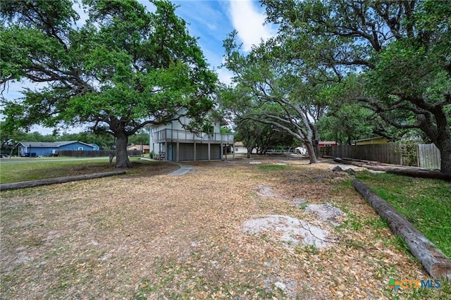 120 Retama Ln, Rockport, TX 78382 - view of yard featuring fence