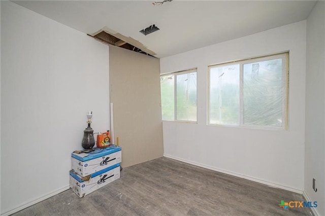 120 Retama Ln, Rockport, TX 78382 - empty room with wood finished floors