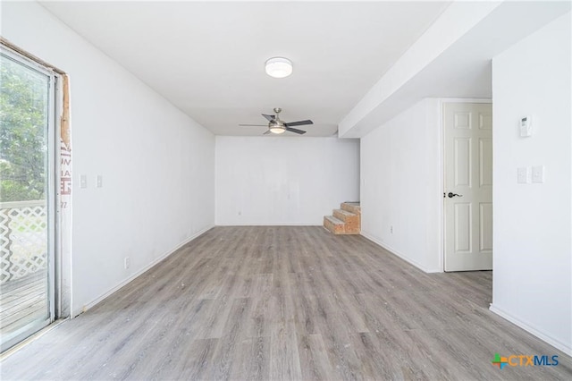 120 Retama Ln, Rockport, TX 78382 - empty room featuring wood finished floors, baseboards, and ceiling fan