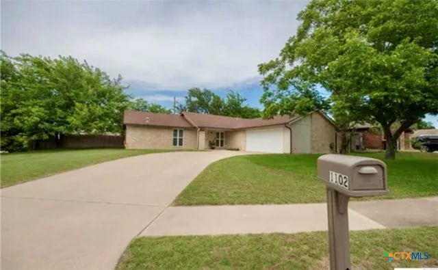 ranch-style house with a front yard