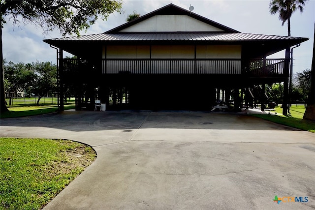 view of property exterior with a yard