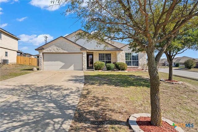 ranch-style house with an attached garage, a front yard, central AC, fence, and driveway