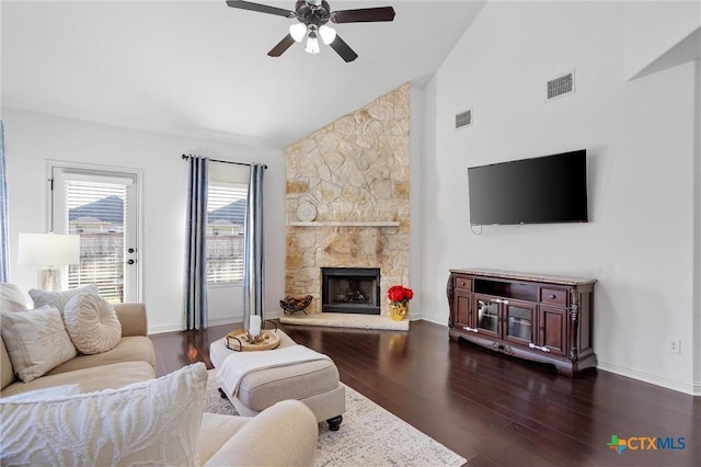 2474 Santa Barbara Loop, Round Rock, TX 78665 - living room featuring ceiling fan, dark wood-type flooring, baseboards, high vaulted ceiling, and a fireplace