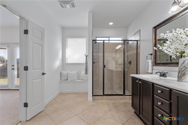 2474 Santa Barbara Loop, Round Rock, TX 78665 - full bath with a stall shower, vanity, tile patterned floors, baseboards, and recessed lighting