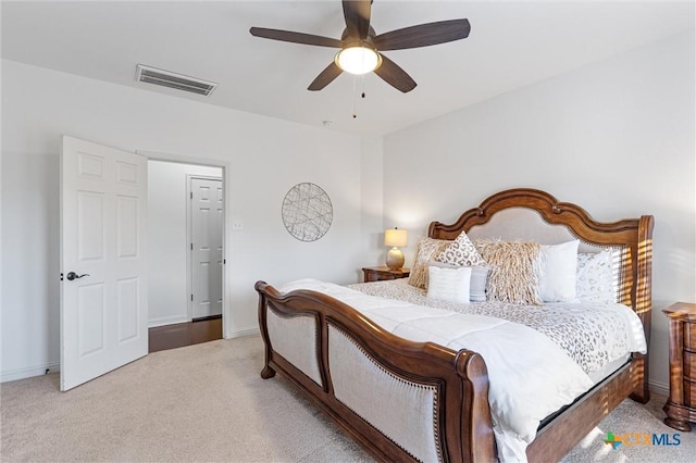 2474 Santa Barbara Loop, Round Rock, TX 78665 - carpeted bedroom with baseboards and a ceiling fan