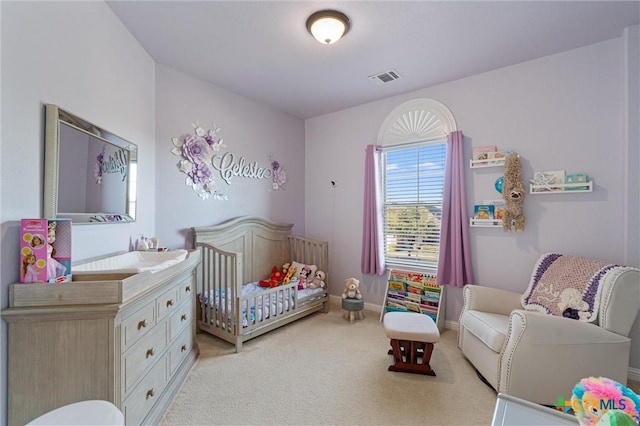 2474 Santa Barbara Loop, Round Rock, TX 78665 - bedroom featuring light colored carpet, a crib, and baseboards