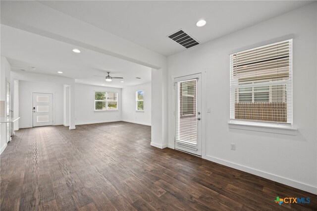3728 Yeoman St, Pflugerville, TX 78660 - unfurnished living room featuring baseboards, a ceiling fan, dark wood-style flooring, and recessed lighting
