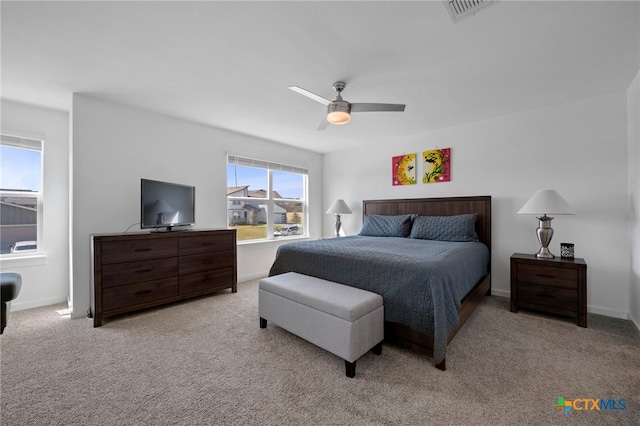 bedroom featuring carpet flooring, visible vents, and baseboards