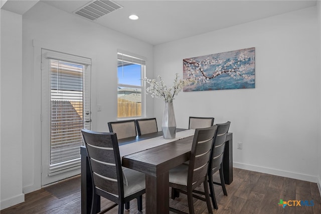 dining room with recessed lighting, visible vents, baseboards, and wood finished floors