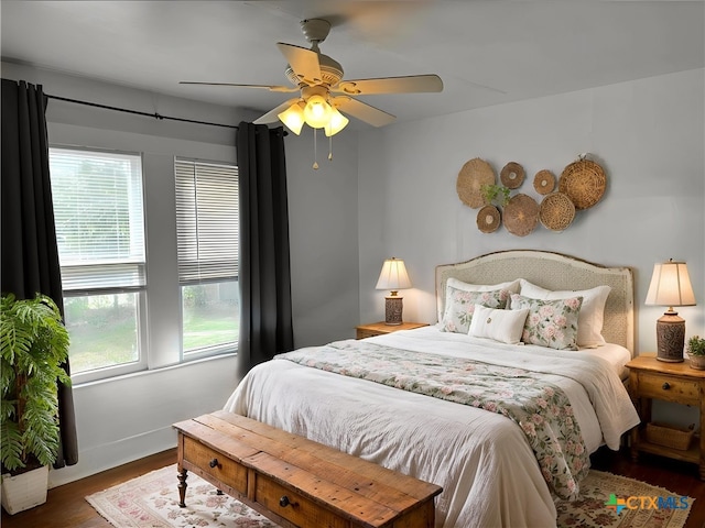 212 Duggan St, Seguin, TX 78155 - bedroom with wood finished floors and a ceiling fan