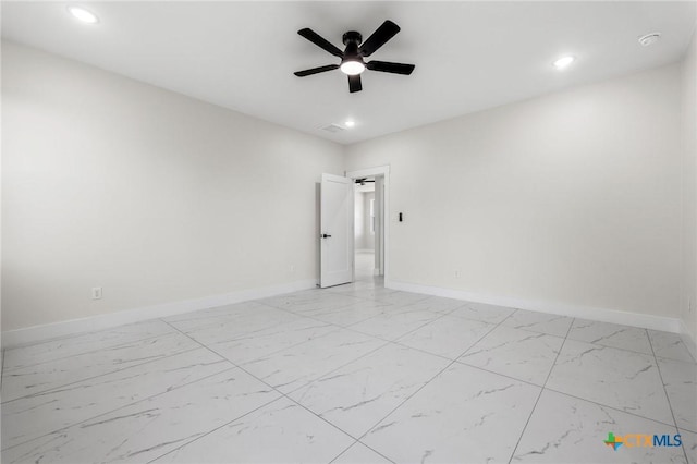 unfurnished room featuring ceiling fan