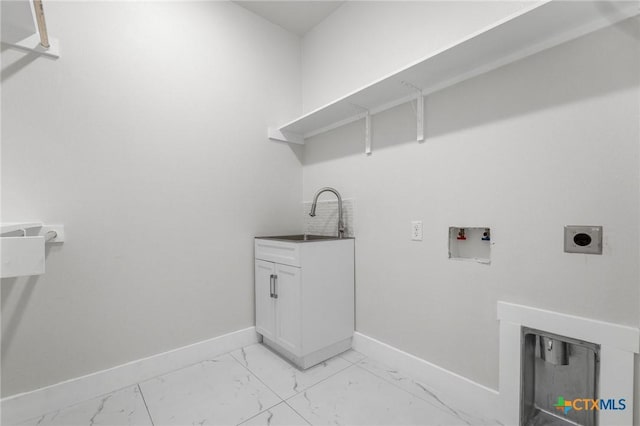 washroom featuring cabinets, sink, hookup for an electric dryer, and hookup for a washing machine