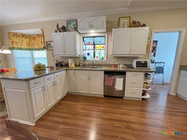 kitchen featuring white cabinetry, stainless steel dishwasher, and sink