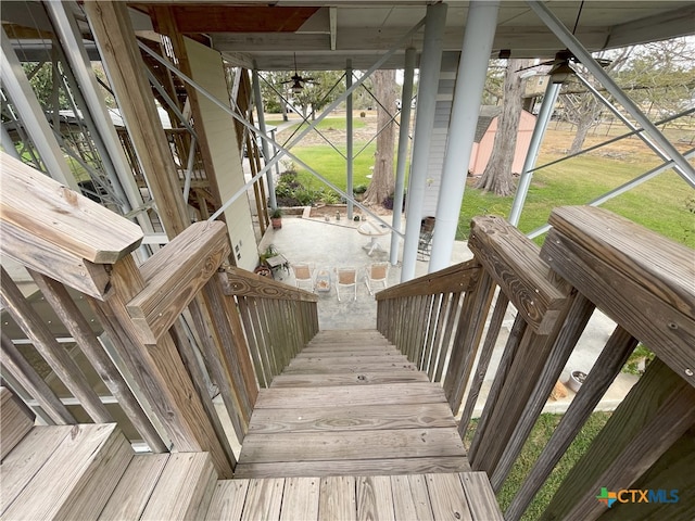 wooden deck with ceiling fan