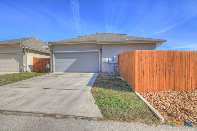 view of property exterior with a garage