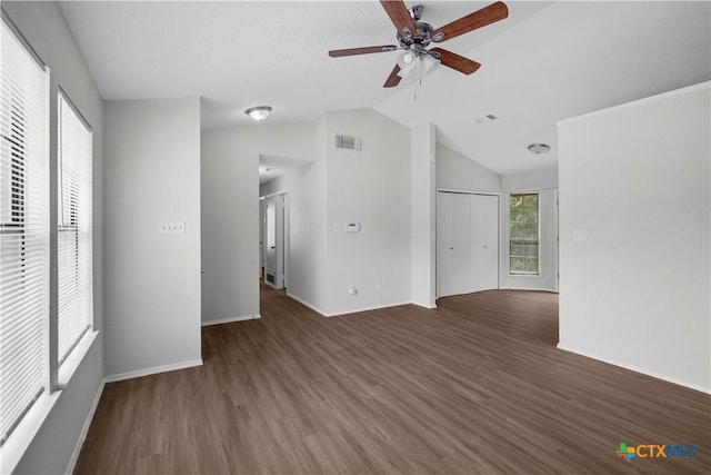 1709 Bobby Lee Dr, Killeen, TX 76549 - unfurnished living room with wood finished floors, vaulted ceiling, ceiling fan, and baseboards