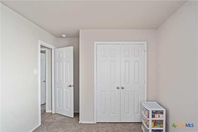 2215 Lucrezia Ct, Harker Heights, TX 76548 - carpeted bedroom with a closet and baseboards