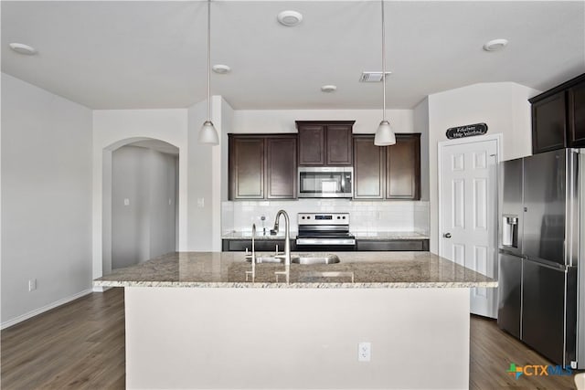 2215 Lucrezia Ct, Harker Heights, TX 76548 - kitchen with appliances with stainless steel finishes, visible vents, a sink, and dark brown cabinetry