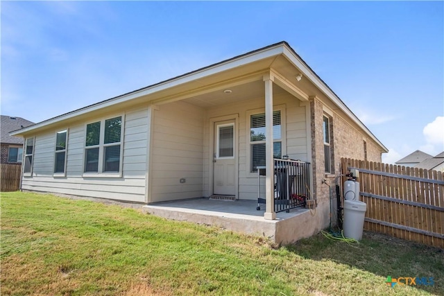2215 Lucrezia Ct, Harker Heights, TX 76548 - rear view of property with fence, a patio, and a yard