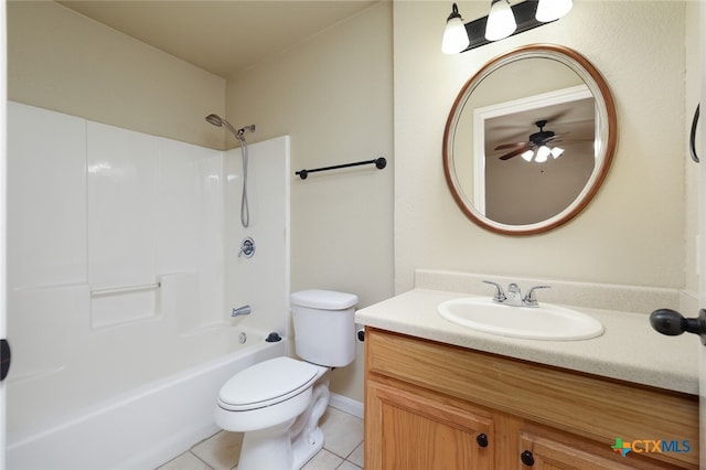 full bathroom with vanity, tub / shower combination, tile patterned floors, and toilet