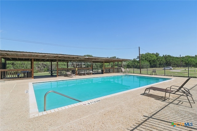 view of pool with a patio area