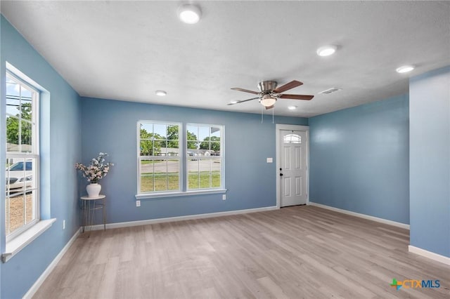 2603 Lone Tree Rd, Victoria, TX 77901 - empty room with wood finished floors, baseboards, ceiling fan, and recessed lighting