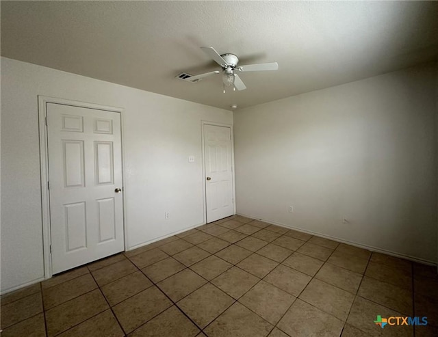 317 Janelle Dr, Copperas Cove, TX 76522 - empty room with tile patterned floors and ceiling fan