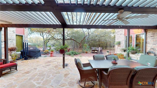 view of patio featuring ceiling fan and area for grilling