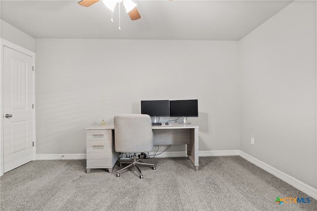 home office featuring ceiling fan and light colored carpet