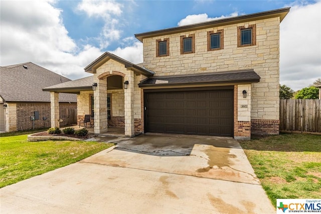 french provincial home featuring stone siding, concrete driveway, brick siding, a garage, and a shingled roof