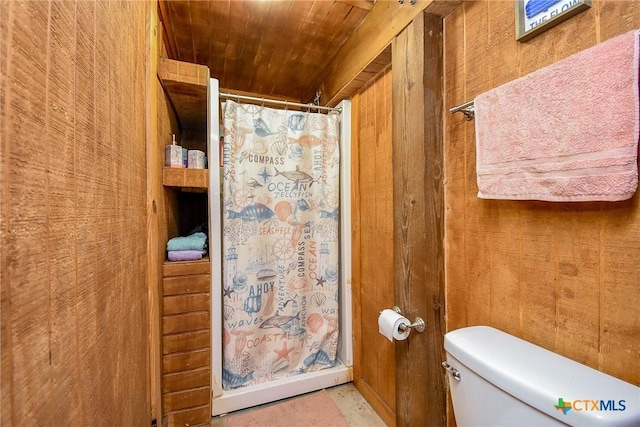 full bath featuring a shower with curtain, wooden walls, toilet, and wood ceiling