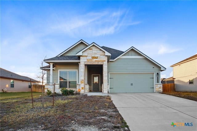 craftsman house with a garage