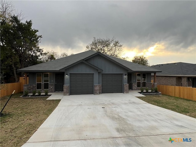 view of front of home with a garage