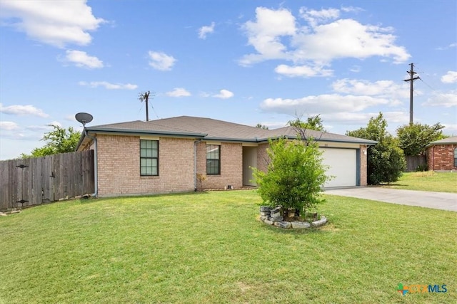 ranch-style house featuring a front lawn and a garage