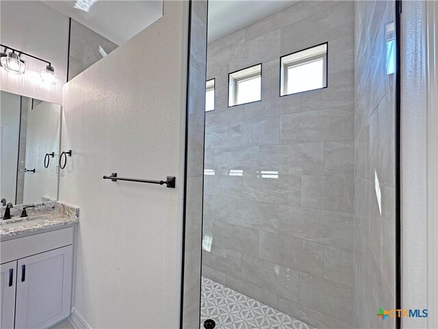 laundry area featuring cabinets, hookup for a washing machine, and electric dryer hookup