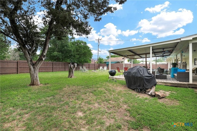 view of yard with a fenced backyard and an outdoor hangout area