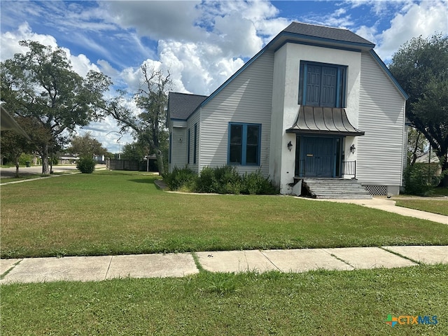 view of front of house with a front yard