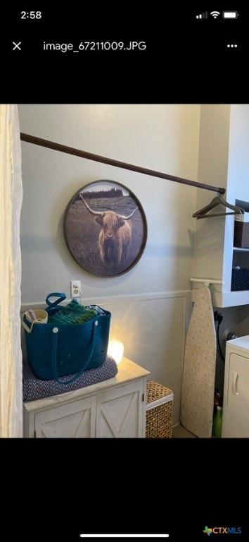 bathroom featuring washer / dryer