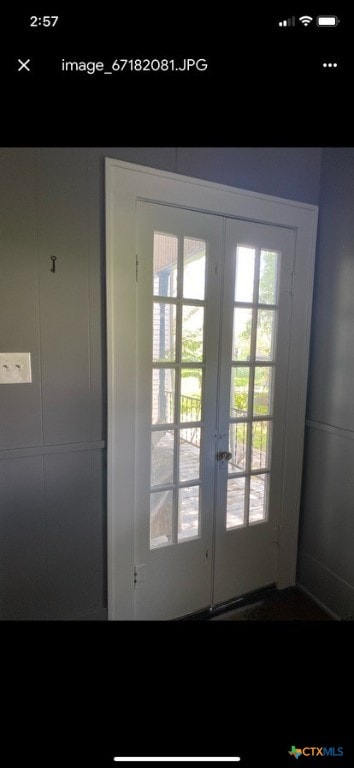 doorway to outside with french doors and plenty of natural light