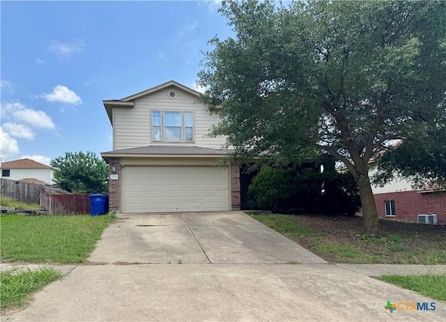 2204 Vernice Dr, Copperas Cove, TX 76522 - view of front of home with a garage, brick siding, and driveway