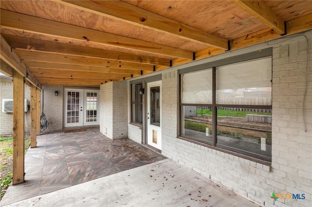 view of patio featuring french doors