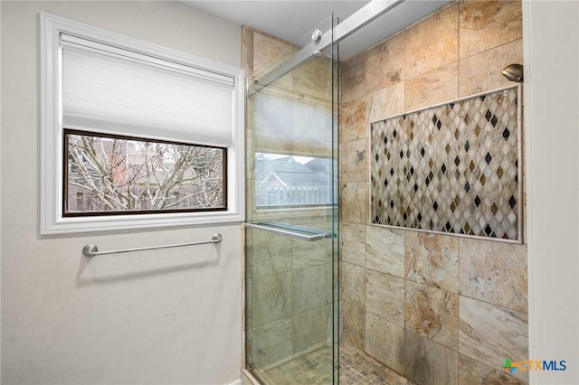 bathroom featuring walk in shower