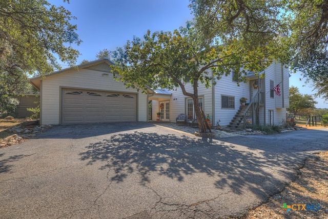 view of front of property with a garage